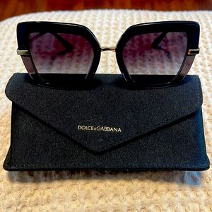 Dolce & Gabbana glasses with case.